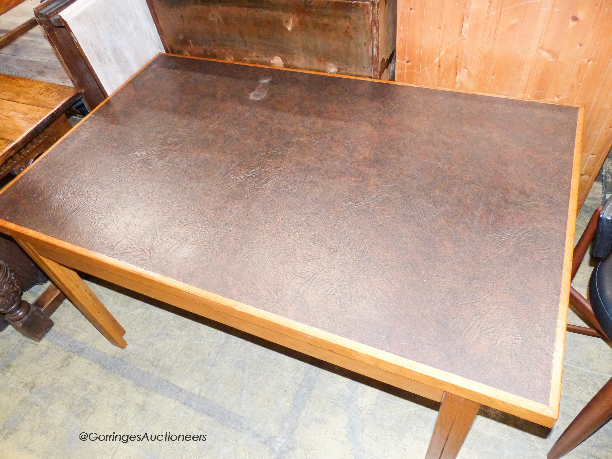 A mid century design Moss & Co rectangular oak writing table circa 1960, length 156cm, depth 95cm, height 75cm